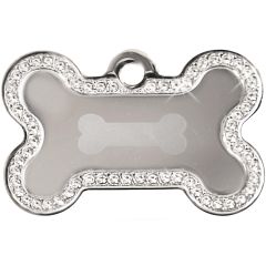 Silverfärgat bricka med hundben och massor av äkta vita Swarovski™ kristaller på en sida. Namnbricka med valfri gravering. Perfekt ID-tag för alla hundar.