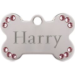Silverfärgat hundben med äkta rosa Swarovski™ kristaller. DjurMaxi graverar din unika ID-bricka efter beställning.